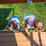 Complex de Joaca Piscul Grayson din lemn de cedru - Centru de catarat cu tobogan si 2 nivel Backyard Discovery 